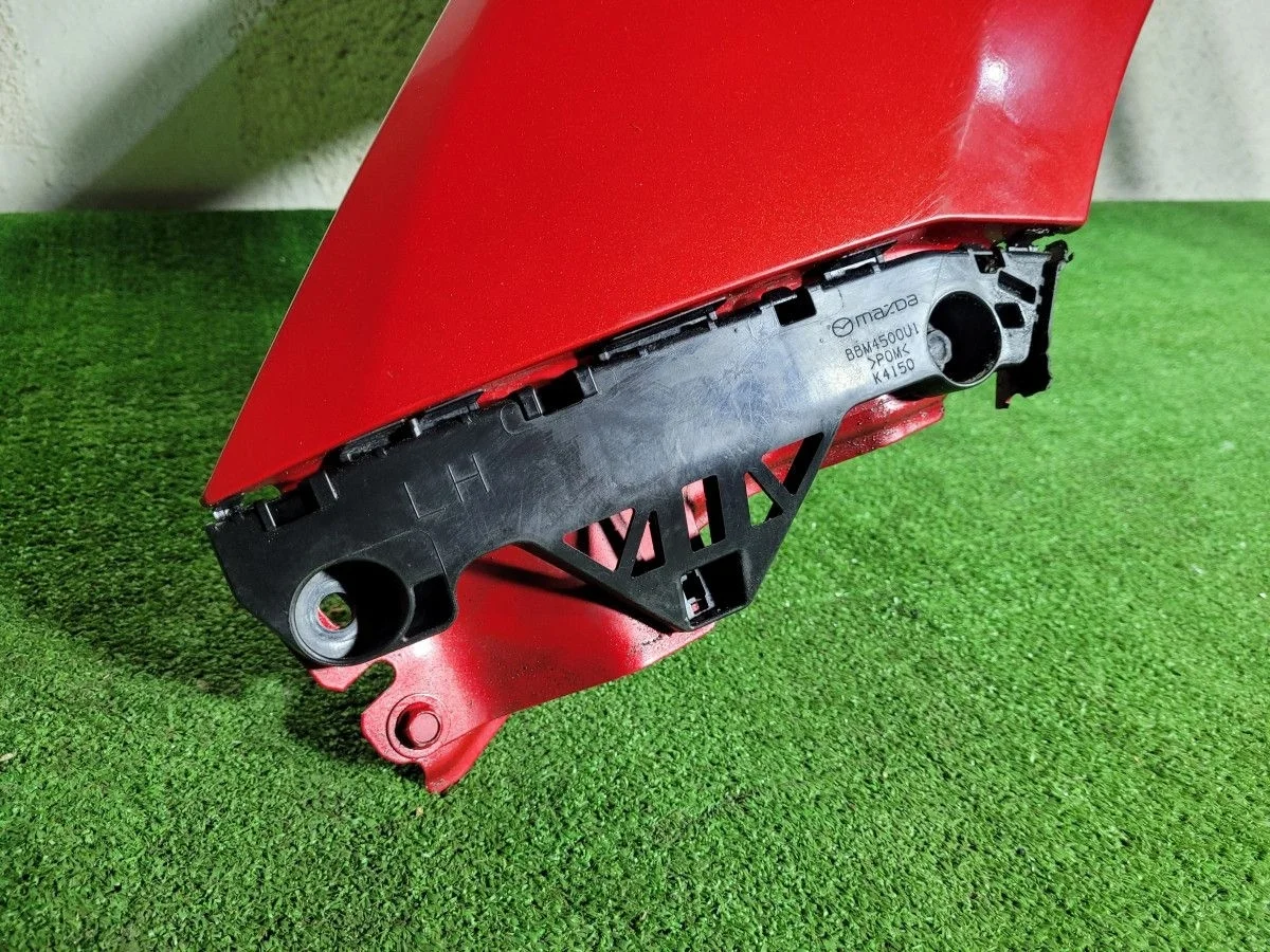 Кронштейн бампера перед лево на Mazda 3 BL