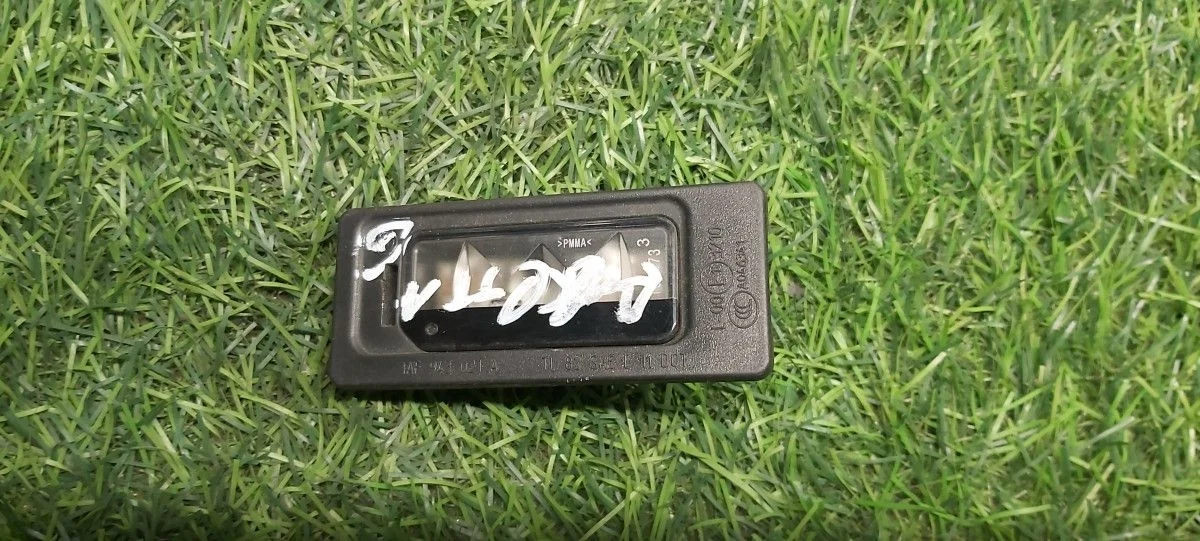 Фонарь подсветки номера Volkswagen