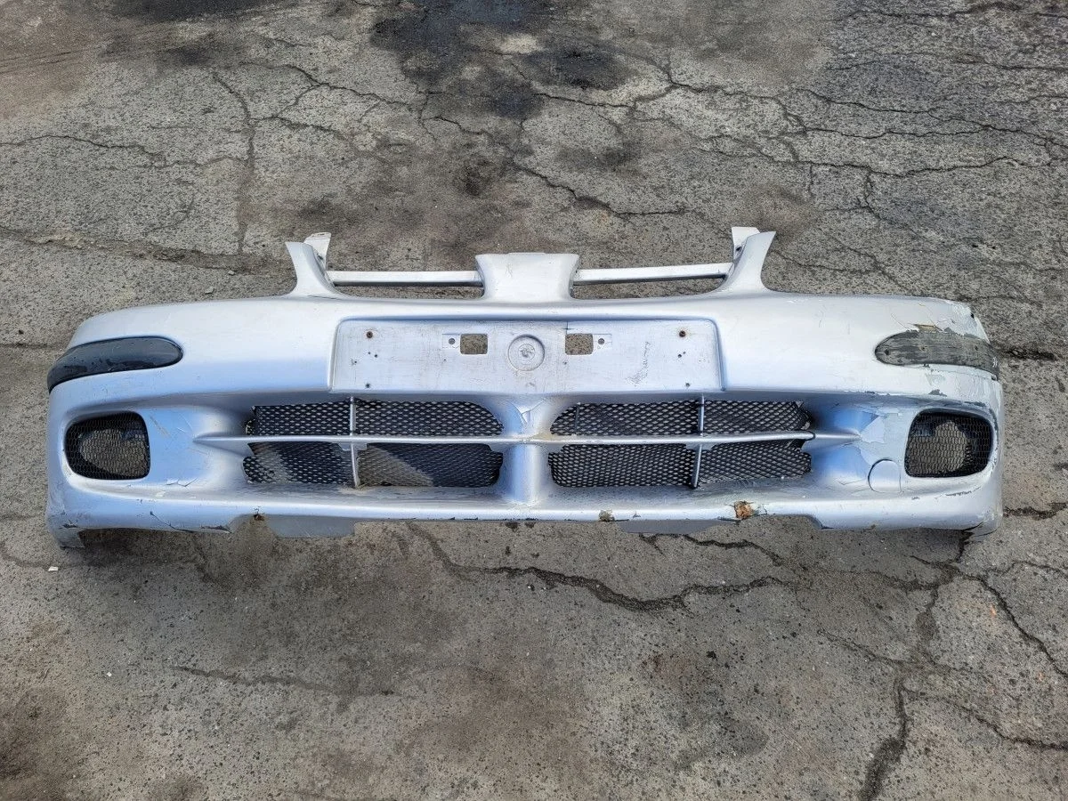 Бампер передний на Nissan Almera N16