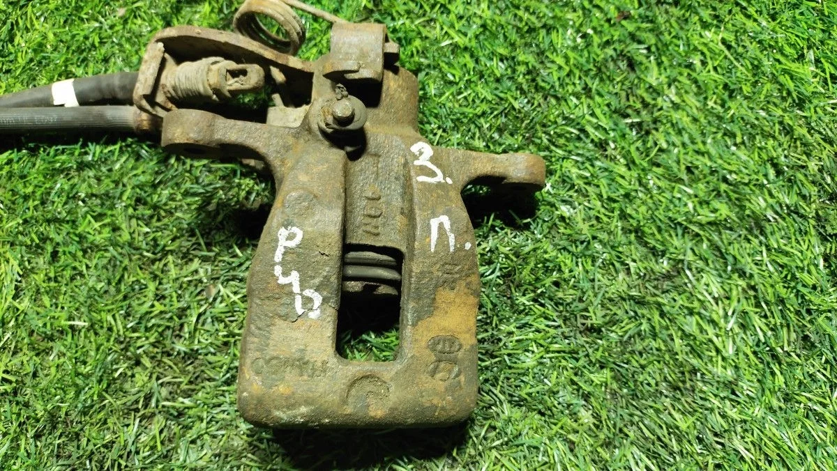 Суппорт задний левый Kia Rio 3