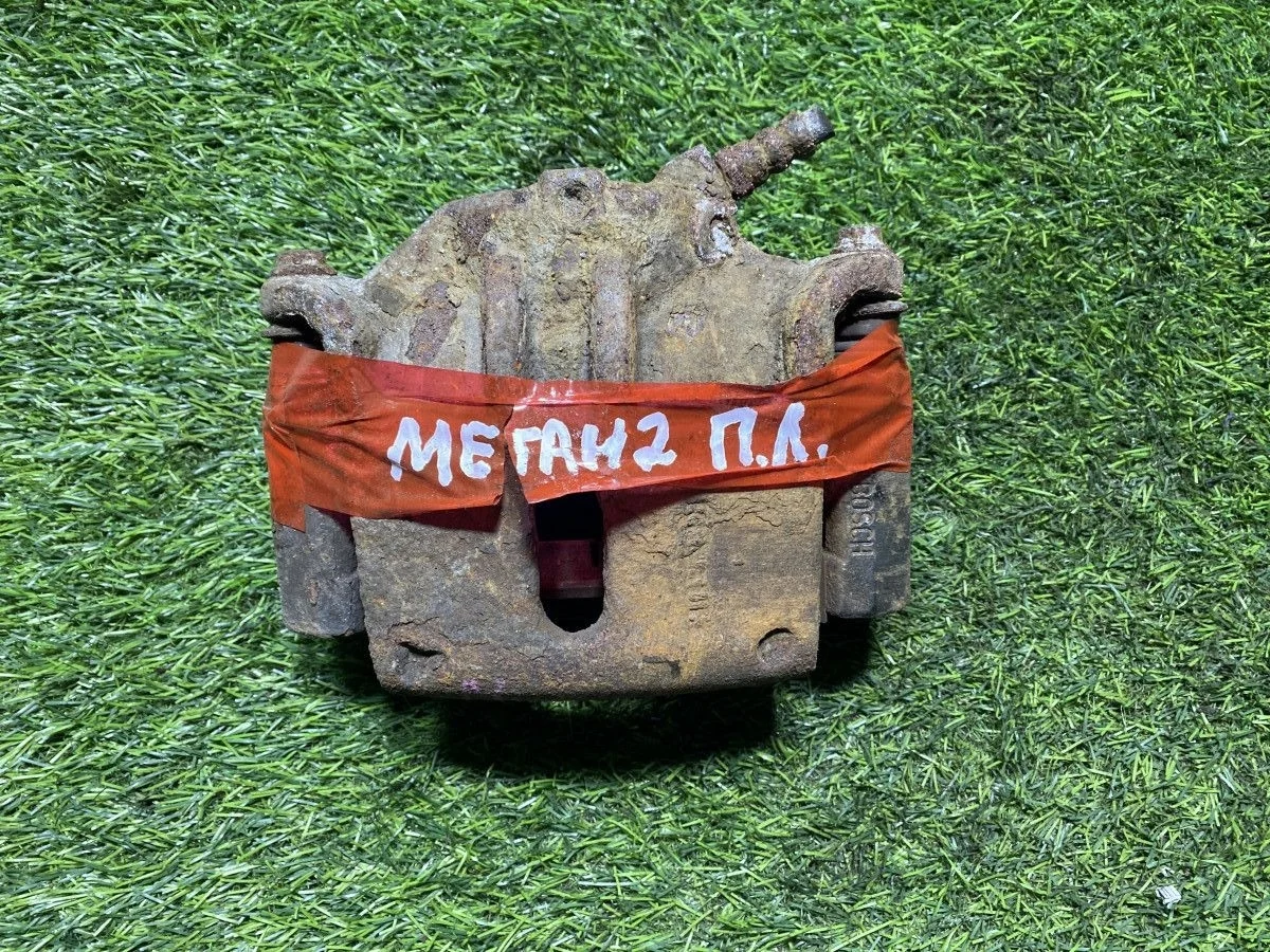 Суппорт тормозной передний левый Renault Megane 2