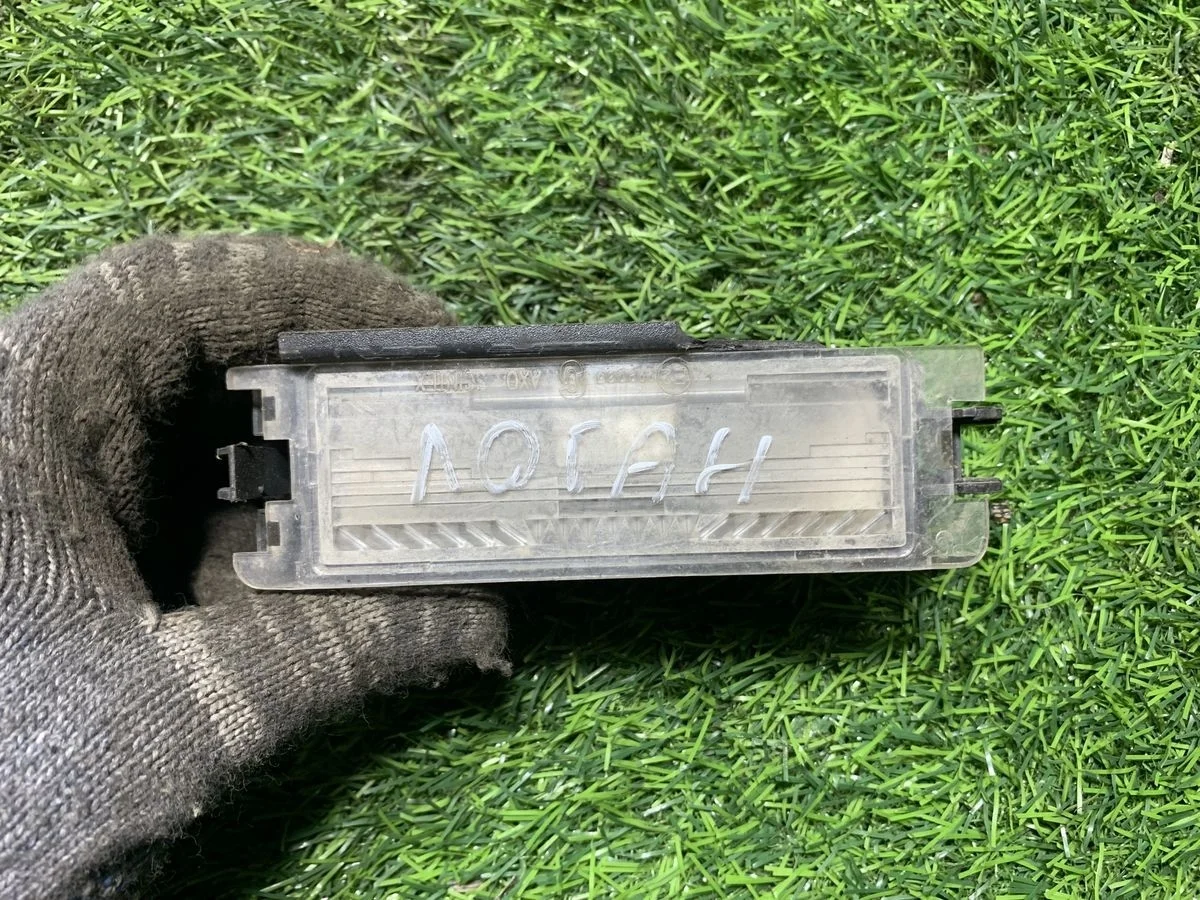 Фонарь подсветки номера Renault Logan