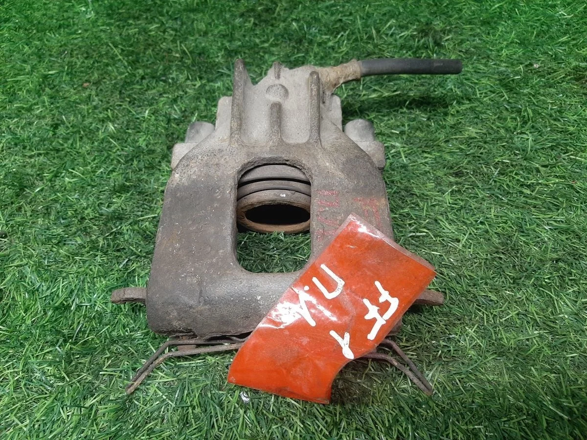 Суппорт передний левый на Ford Focus 1