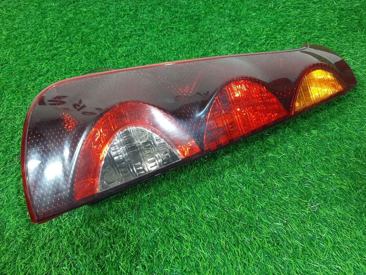 Фонарь левый на Nissan Note E11