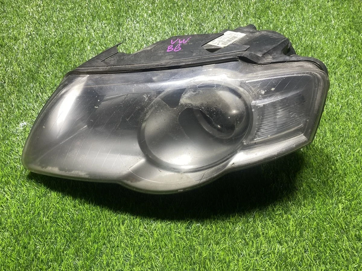 Фара передняя левая Volkswagen Passat B6