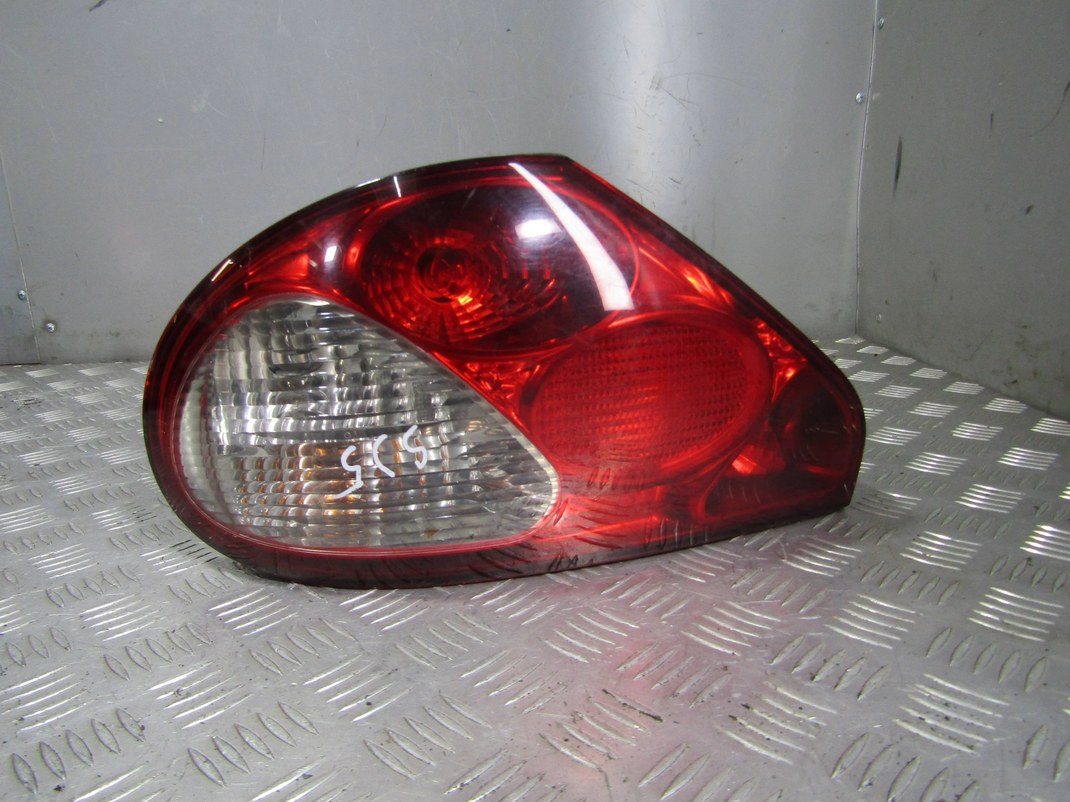 Фонарь внешний левый JAGUAR X-type 2001-2009