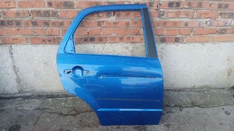 Дверь задняя правая Suzuki Sx4 YA