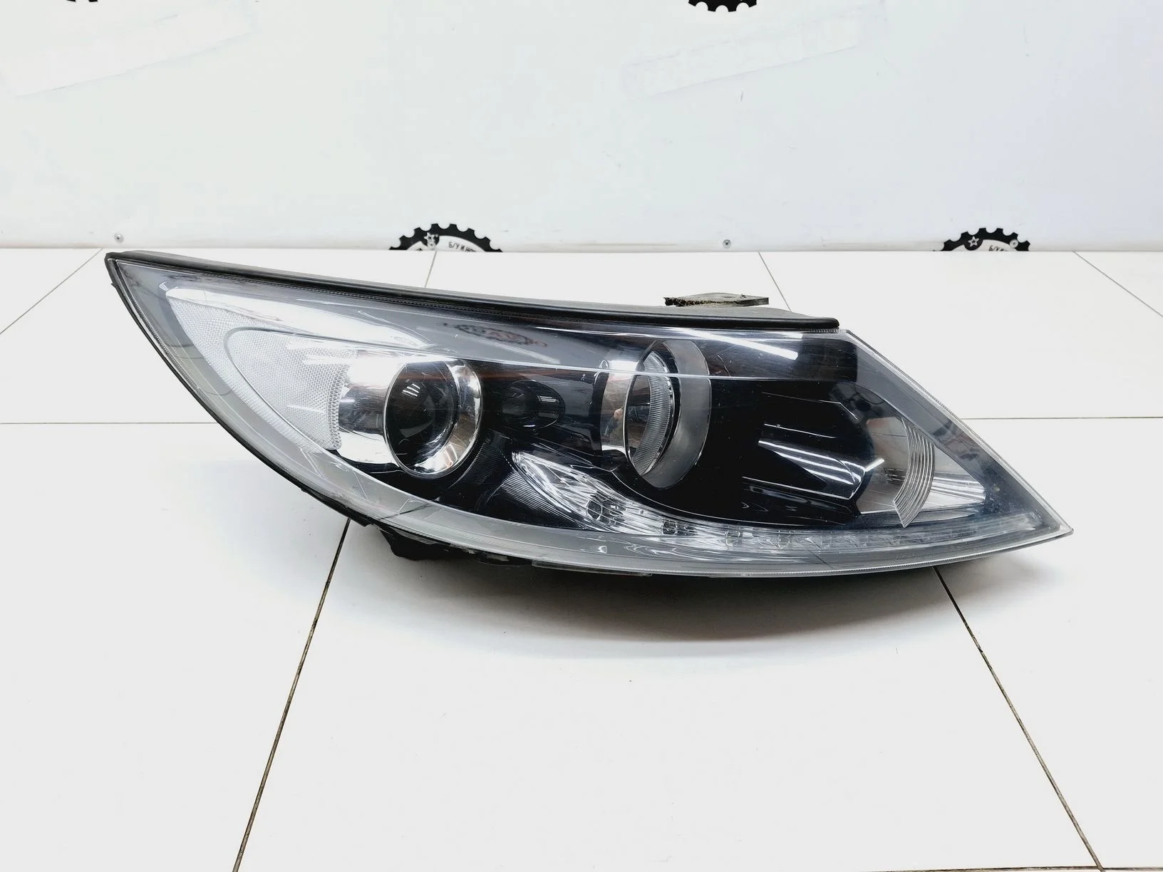 фара Kia Sportage III (SL) 2010-2016