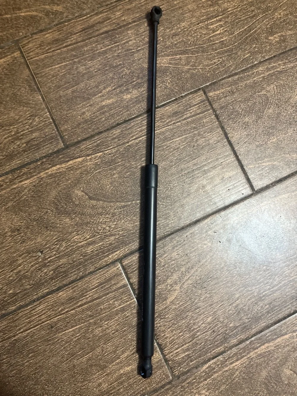 Амортизатор капота Renault Logan II (2012—2018)