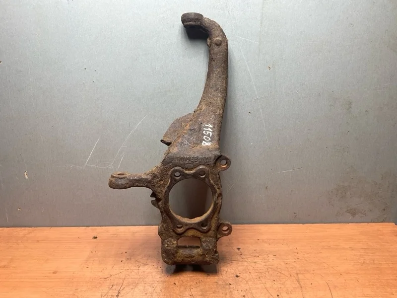 Поворотный кулак Nissan Navara D40 2005-2014 40015EB000, передний левый