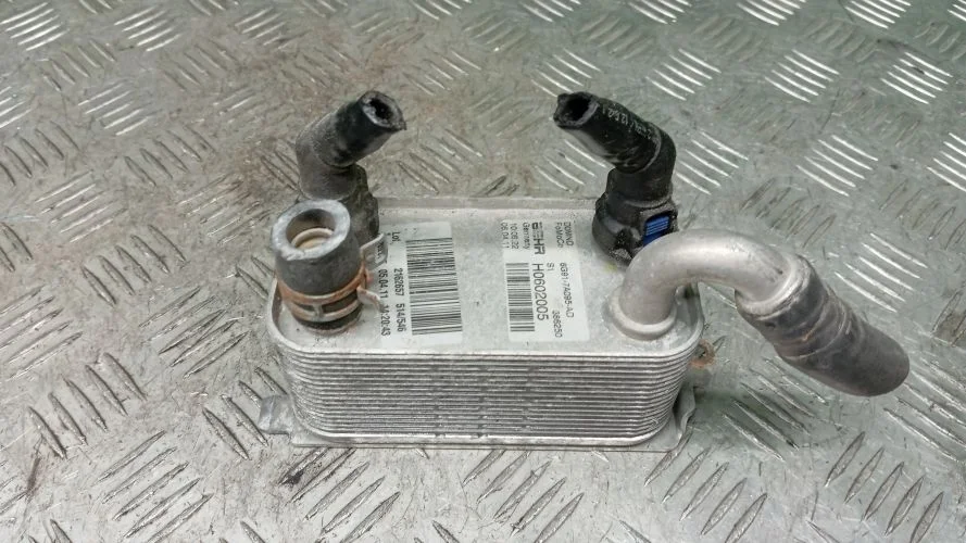 радиатор масляный Ford,Volvo,Land Rover UFDB,D5244T4,D5244T10,D4204T,224DT CB8,AS60,DZ,BD,AS71,L359,AS70 Ford,Volvo,Land Rover Freelander UFDB,D5244T4,D5244T10,D4204T,224DT CB8,AS60,DZ,BD,AS71,L359,AS70 6G917A095AD,1446535,30792231,LR002916