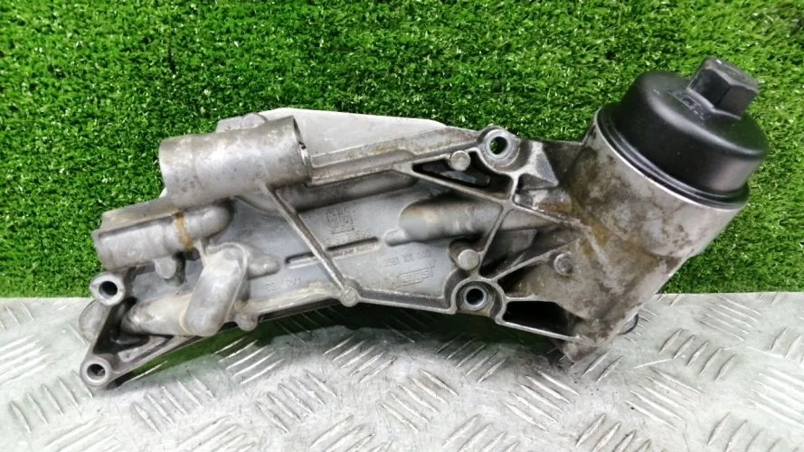 корпус масляного фильтра Chevrolet  F16D4 J300 Chevrolet Cruze F16D4 J300 12992593