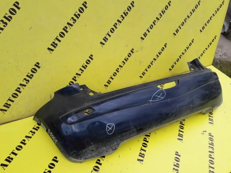 Бампер задний Nissan Note (E11) 2006-2013 850229U040