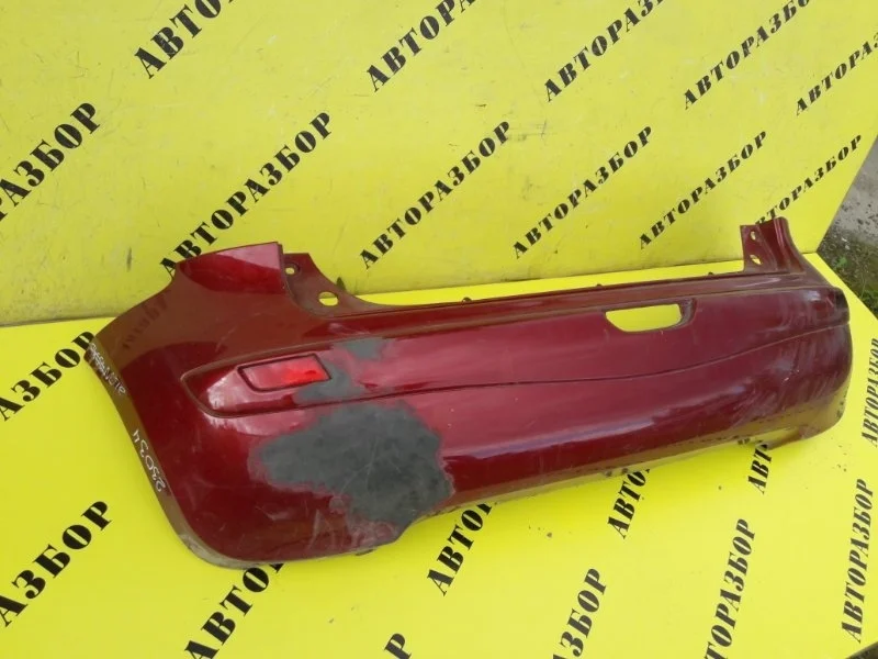 Бампер задний Nissan Note (E11) 2006-2013 850229U040