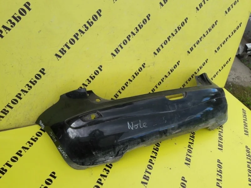 Бампер задний Nissan Note (E11) 2006-2013 850229U040