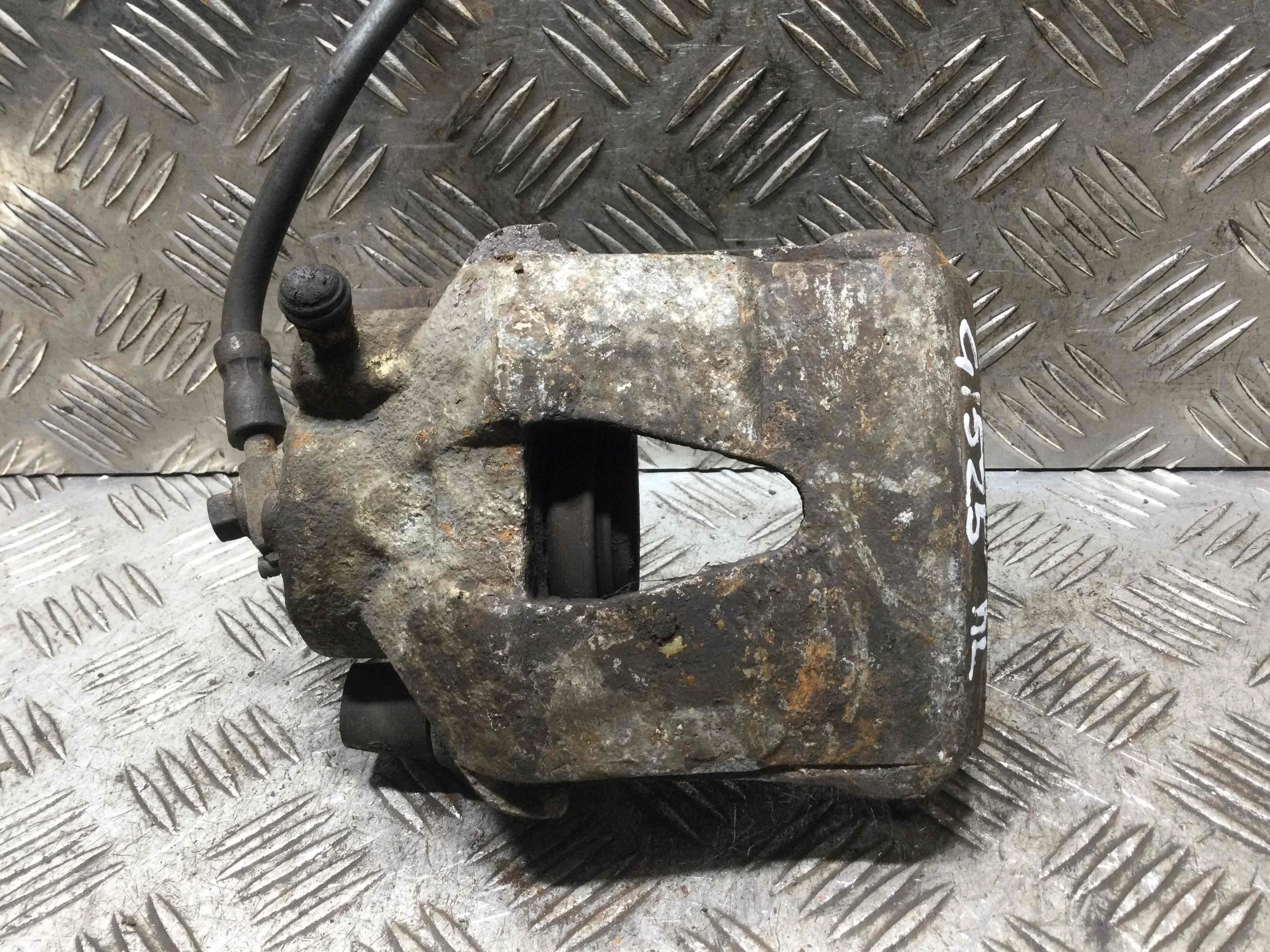 Суппорт передний левый Volkswagen Polo 4 поколение (2001-2005) бензин 1.4 i Механика Х/б