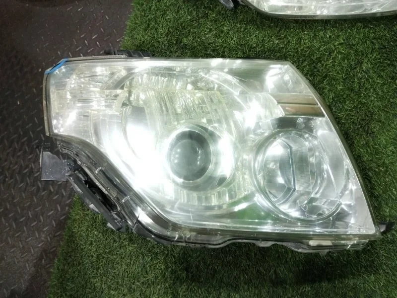 Фара ксеноновая MITSUBISHI PAJERO 2006-2020 V8#W, V9#