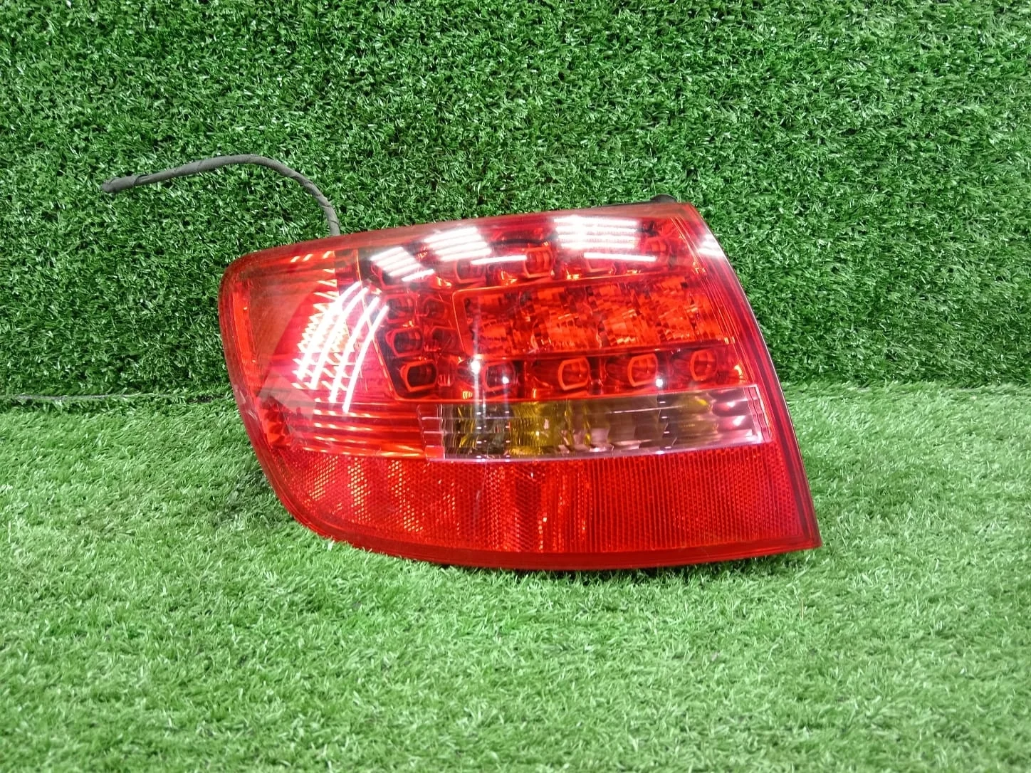 Фонарь задний левый Audi A6 C6 универсал Audi A6 C6 ALLROAD  CCE; AUK 4WD  4F9945095E