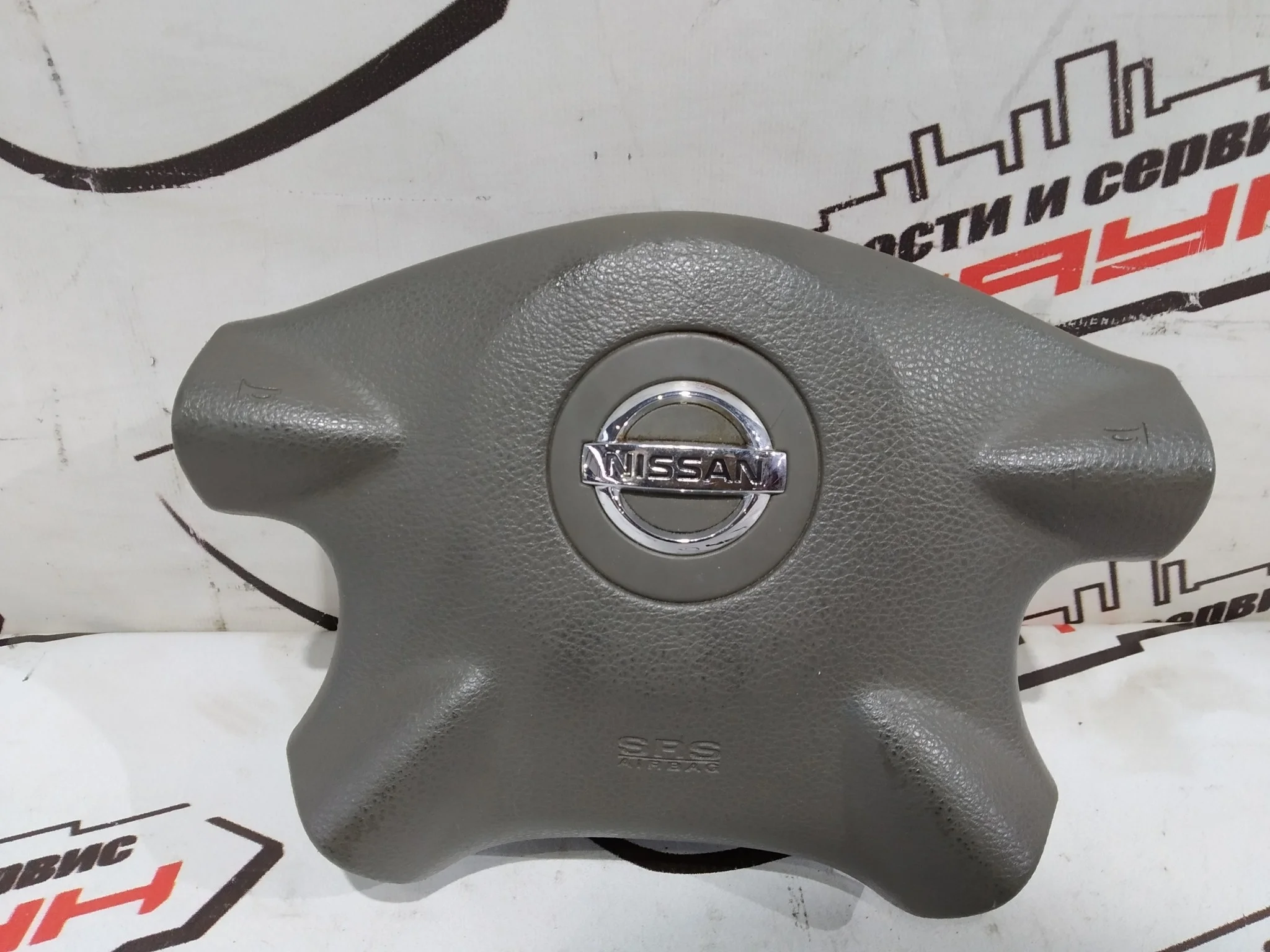 AIRBAG НА РУЛЬ NISSAN AVENIR PRIMERA WINGROAD X-TRAIL ... WFY11 WHNY11 WHP12 WHY11 WPY11 WRY11 WTNP12 WTP12 ПУСТОЙ 4 ЛУЧА ЗНАЧОК ХРОМ K8510AU060 серый S3436