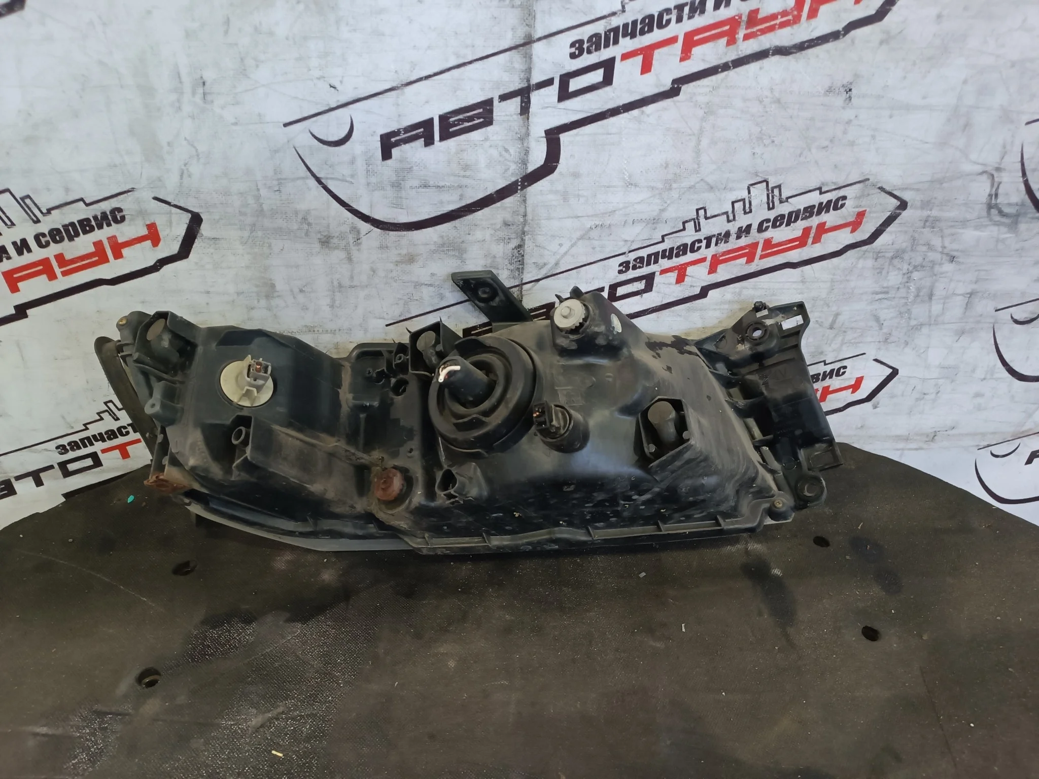 ФАРА MITSUBISHI CHARIOT GRANDIS N84W N86W N94W N96W 10087262 (65) ГАЛОГЕН ЛЕВАЯ MR391745 S3553Z