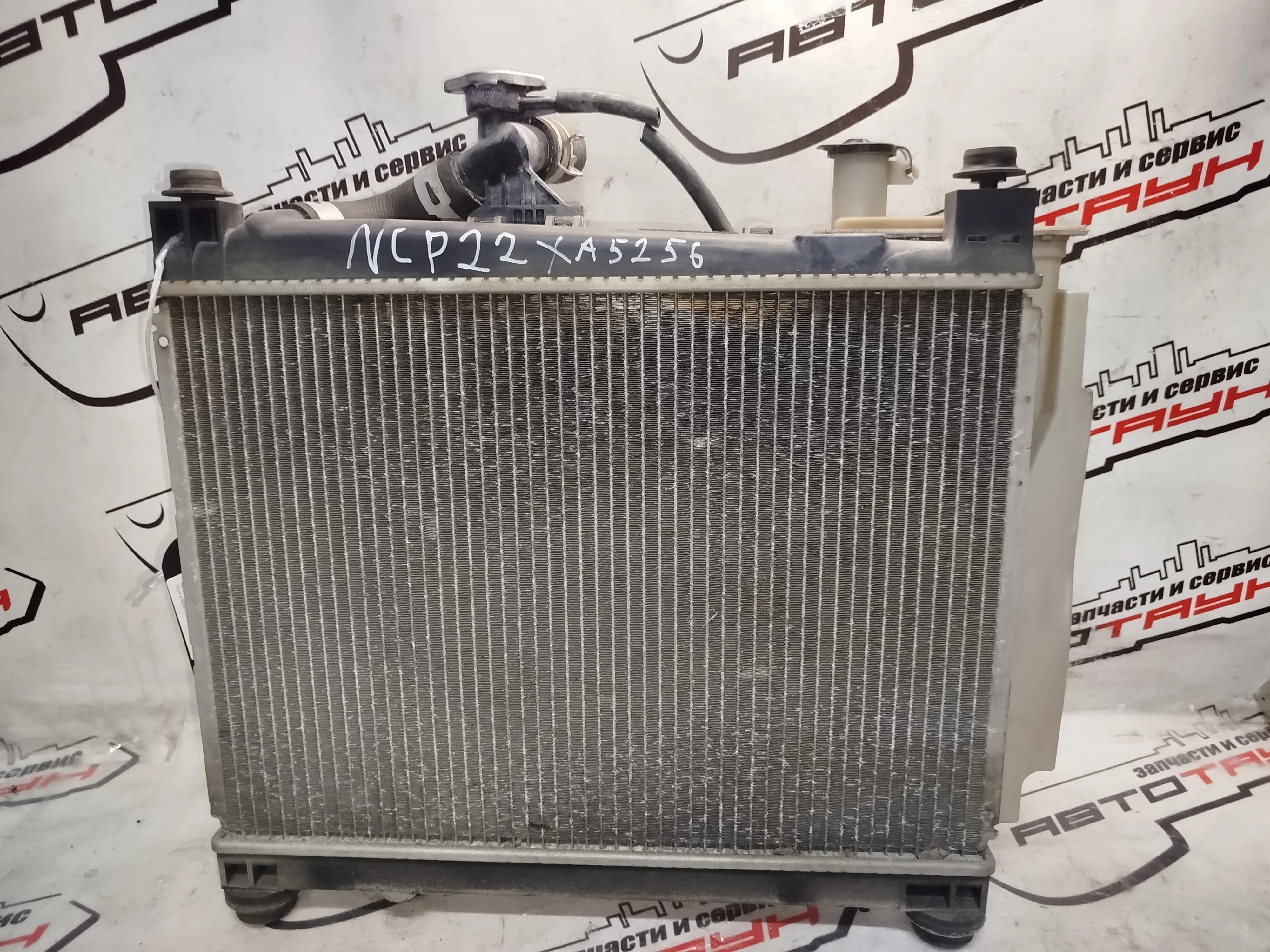 РАДИАТОР ДВИГАТЕЛЯ TOYOTA 1NZ-FE 2NZ-FE ... SUCCEED VITZ WILL CYPHA WILL VI YARIS YARIS VERSO ... NCP61 NCP65 NCP70 NCP75 NCZ20 NCZ25 АТМ 1640021070 XA5256Z