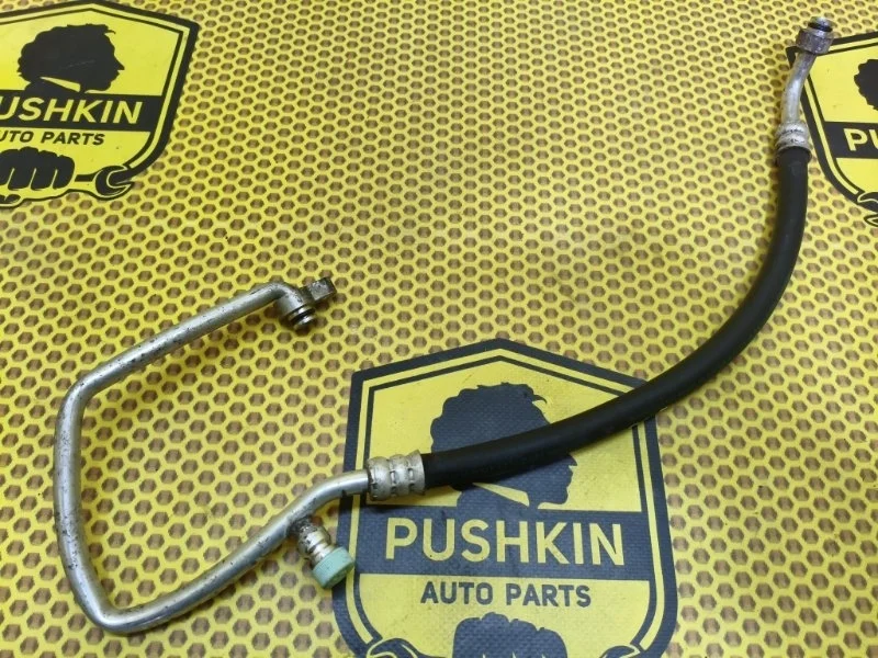 Трубка кондиционера короткая от компрессора Suzuki