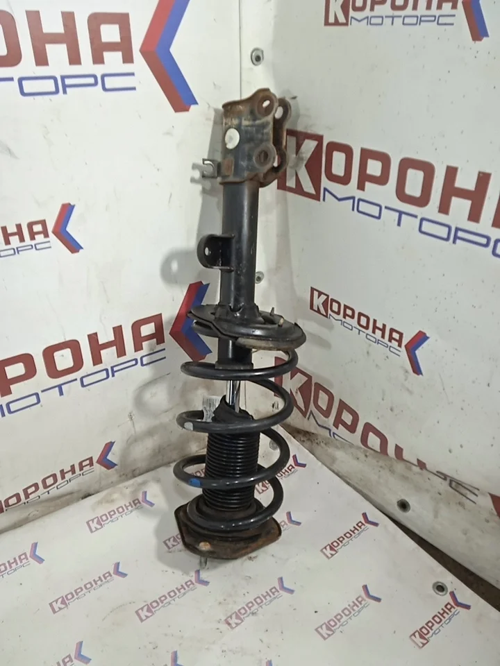 Амортизатор передний левый Б/У Б/У1