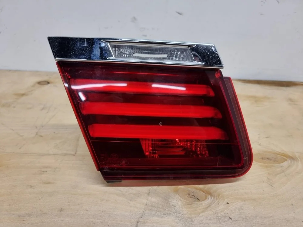 Фонарь в крышку багажника BMW 7 2012 F01