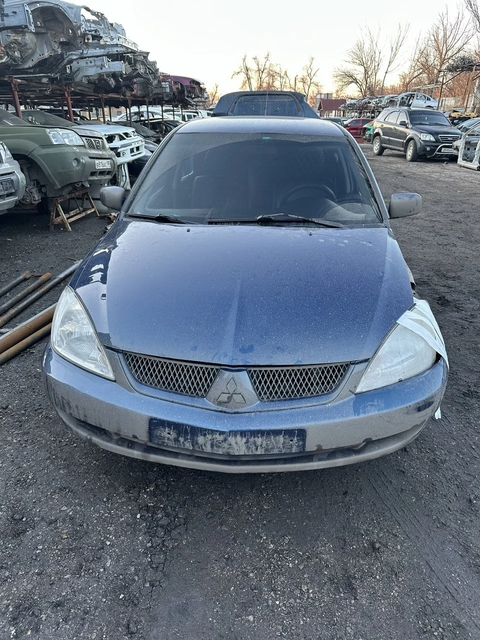 Бампер передний Mitsubishi Lancer 9 Седан CS 2003-2010 1.6 (98Hp) (4G18) FWD MT
