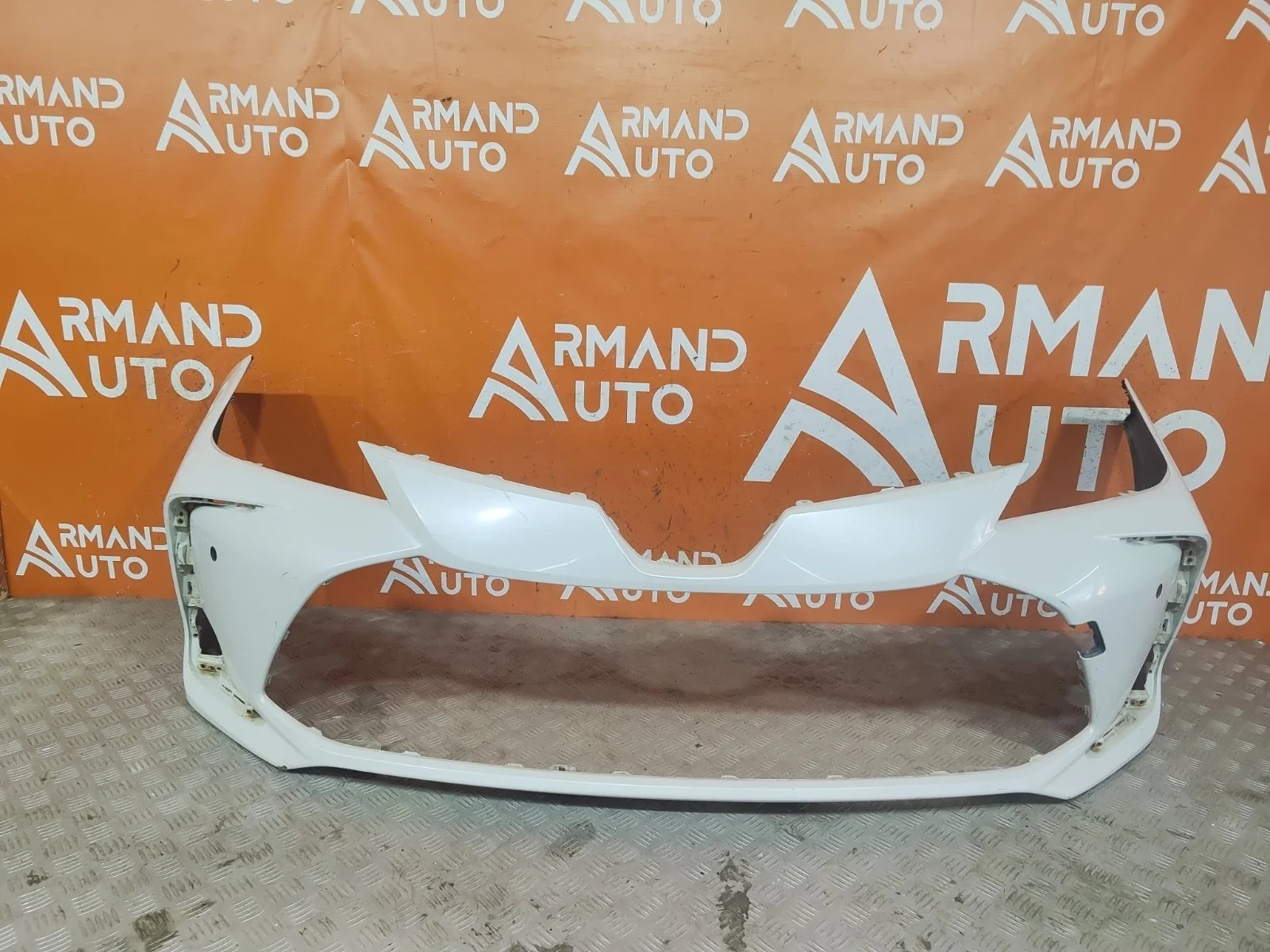 Бампер Toyota Corolla 2018-нв 12 E210