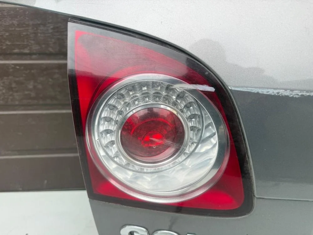 Фонарь левый в крышку багажника VW Гольф Плюс