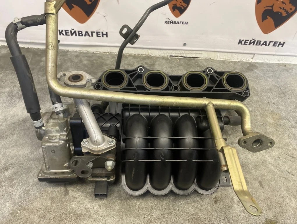 Коллектор впускной Mitsubishi Colt 2004