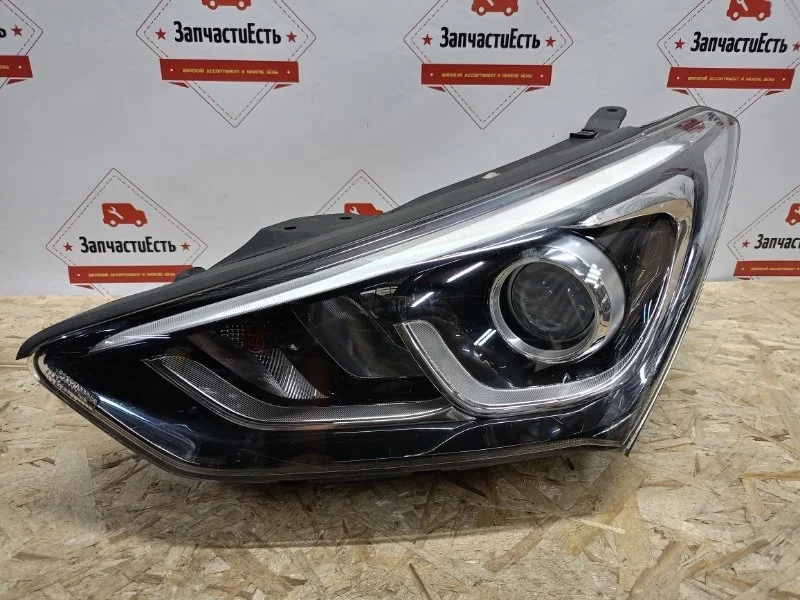Фара левая Hyundai Santa Fe 3 2015-2019 921012W600 DM