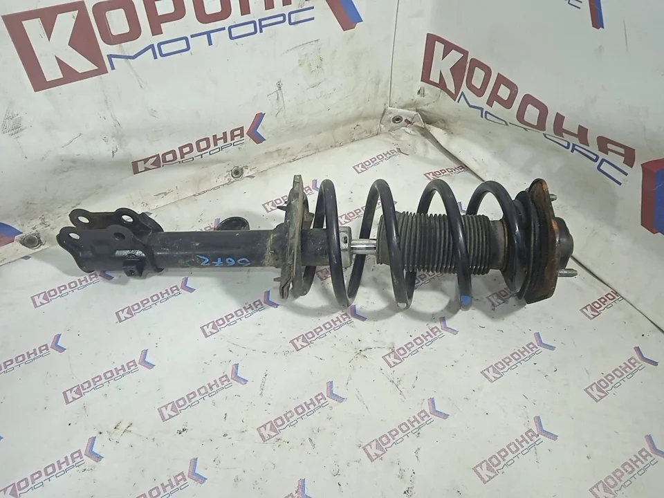 Амортизатор передний правый Б/У в сборе