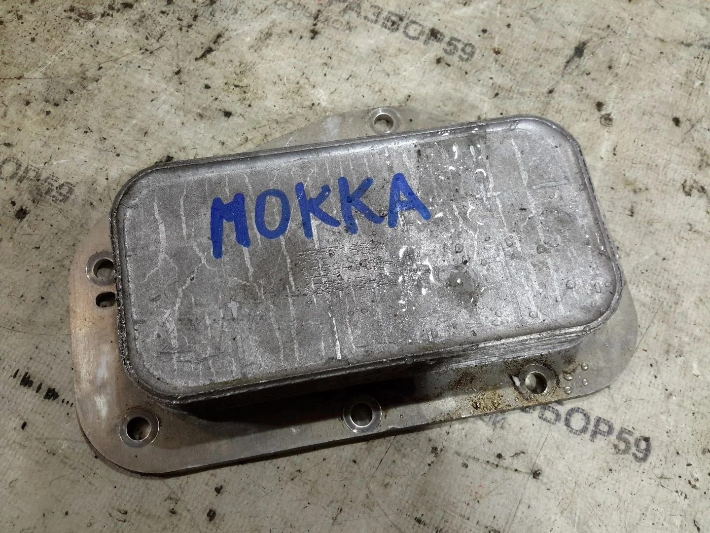Радиатор масляный Opel Mokka