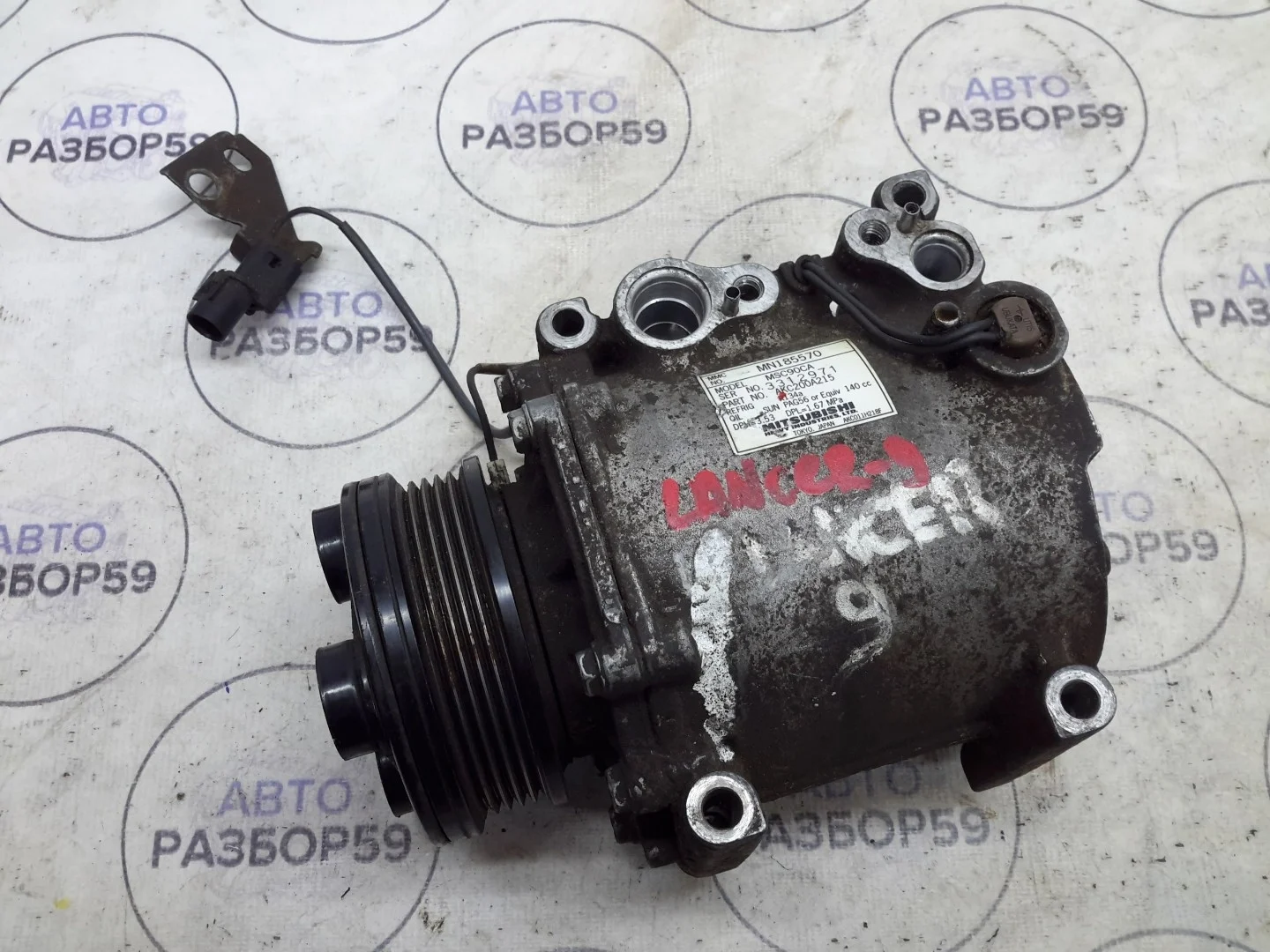Компрессор кондиционера Mitsubishi Lancer 9