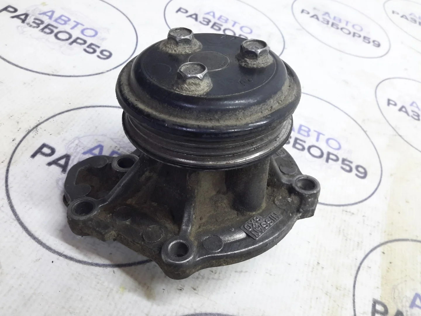 Помпа Nissan Note E11