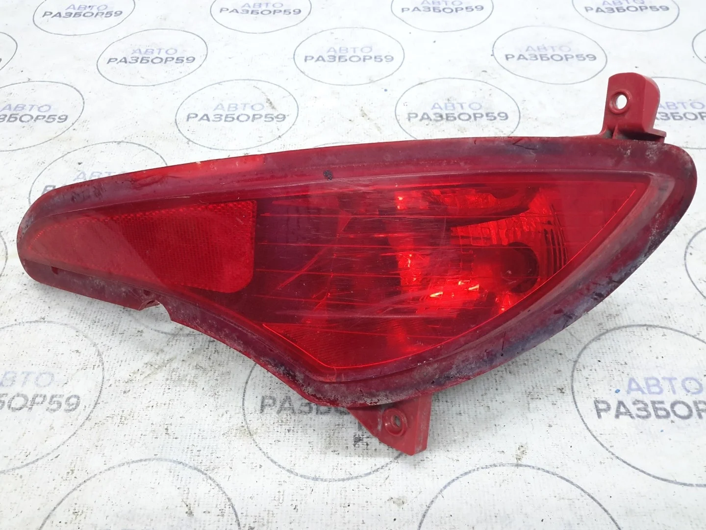 Фонарь противотуманный задний Hyundai Solaris 1