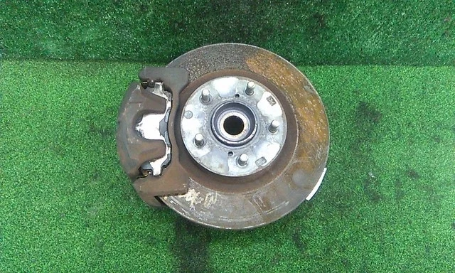 Кулак поворотный левый NA4W MITSUBISHI GRANDIS NA4W 2003-2011
