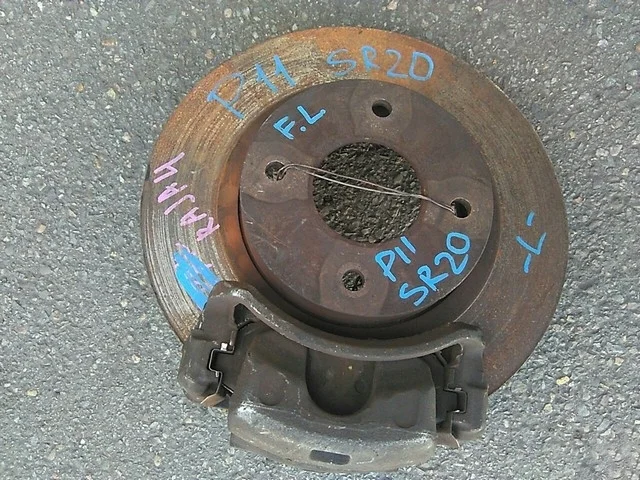 Суппорт тормозной передний левый P11 NISSAN PRIMERA II P11 1995-2000