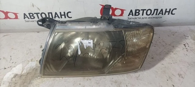 Фара левая V73W MITSUBISHI PAJERO III / MONTERO III V6 / V7 2003-2006