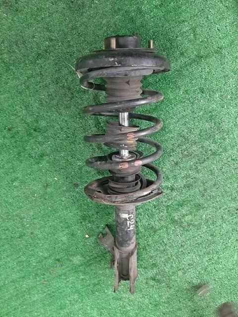 Амортизатор подвески передний левый C24 NISSAN SERENA II C24 1999-2001, SERENA II C24 2001-2005