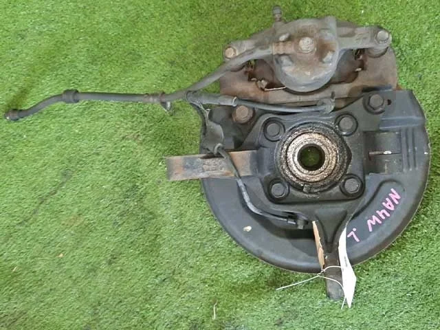 Кулак поворотный левый NA4W MITSUBISHI GRANDIS NA4W 2003-2011