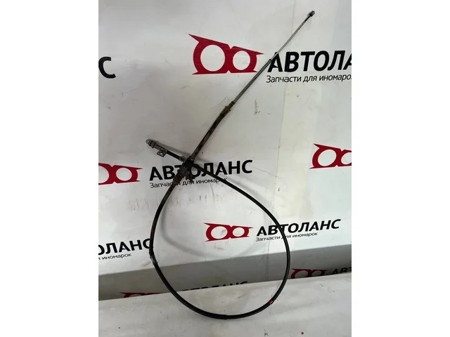 Трос стояночного тормоза левый V75W MITSUBISHI PAJERO III / MONTERO III V6 / V7 2000-2002, PAJERO III / MONTERO III V6 / V7 2003-2006