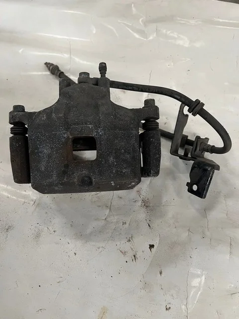 Суппорт тормозной передний левый CW6W MITSUBISHI OUTLANDER XL CW 2007-2010, LANCER X CY 2007-2010
