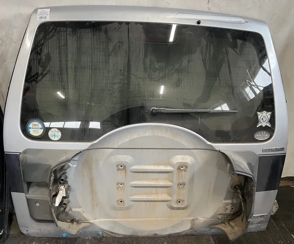 Крышка багажника (замята верхняя часть) V93W MITSUBISHI PAJERO IV / MONTERO IV V8 / V9 2006-2011, PAJERO IV / MONTERO IV V8 / V9 2011-2014