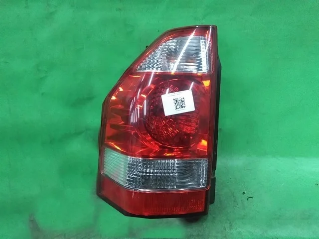 Фонарь задний левый V63W MITSUBISHI PAJERO III / MONTERO III V6 / V7 2003-2006