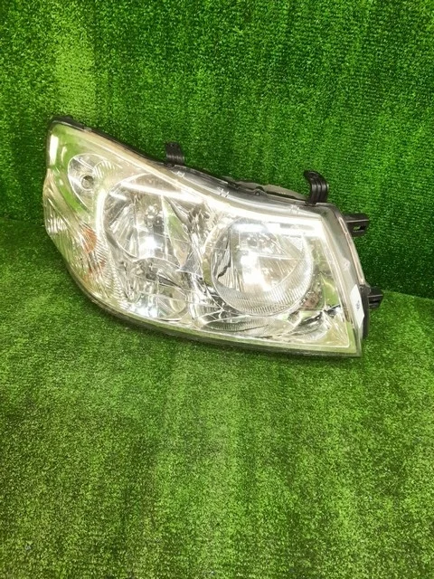 Фара правая M12 NISSAN LIBERTY / PRAIRIE M12 2001-2004