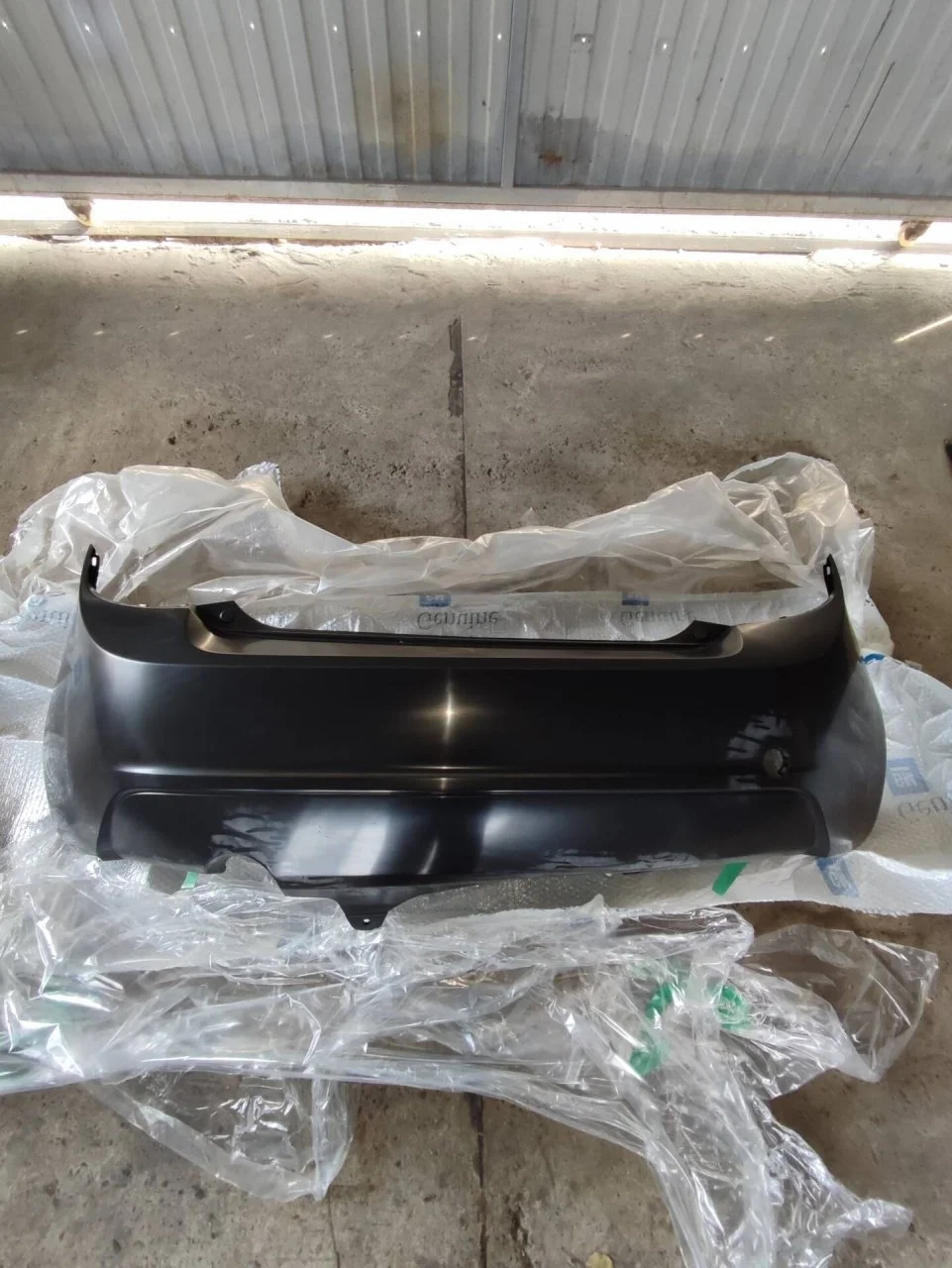 Бампер Chevrolet Aveo T300 95460678 T300, задний