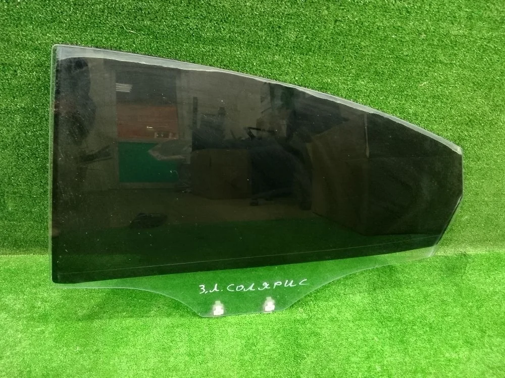 Стекло задней левой двери Hyundai Solaris I